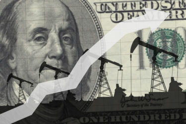 Oil pumps on the background of 100 dollars.