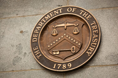 Plaque of the Department of Treasury on the Treasury Building in Washington, DC