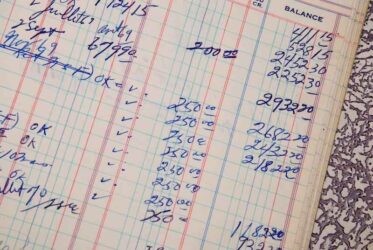 Detail of a handwritten ledger amount in blue color