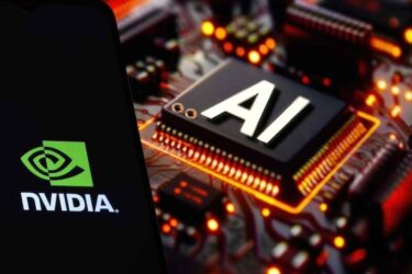 NVIDIA logo on phone and blurred AI chip on the background