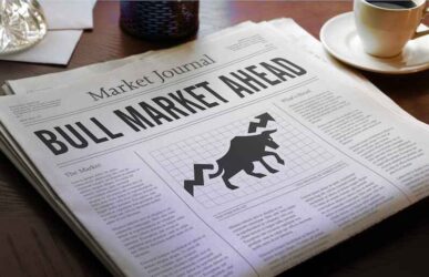 Bull stock market ahead headline newspaper on desk