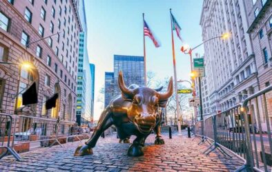 View of Charging Bull bronze statue, Wall Street, Lower Manhattan in the morning.