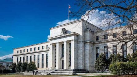 two security guards standing in front of the United States Federal Reserve System headquarters