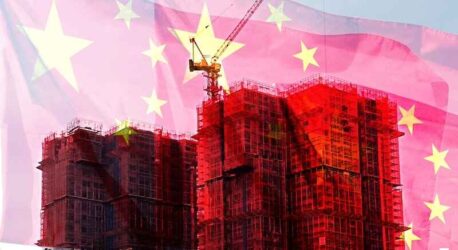 Double exposure creative hologram of unfinished supertall building and Chinese flag.