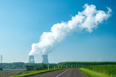 View on cooling towers of nuclear power plant thermal power station in which heat source is nuclear reactor, France, Europe, cheap energy source