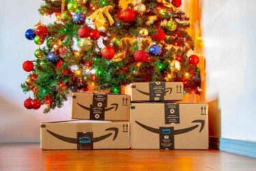 Amazon boxes under a Christmas tree.