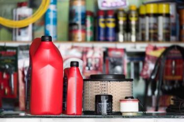 Oil filter, Air Filter, Oil lubricant, Fuel Filter and Cabin or Air Conditioner Filter in the auto parts shop.