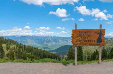 Welcome posted of Jackson hole viewpoint looking down to the valley with the Tetons mountains Wyoming state.