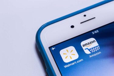Image of Walmart and Amazon apps on a cell phone